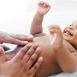 Baby massage (The New Times)