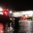 Plane skids off Jacksonville runway into river