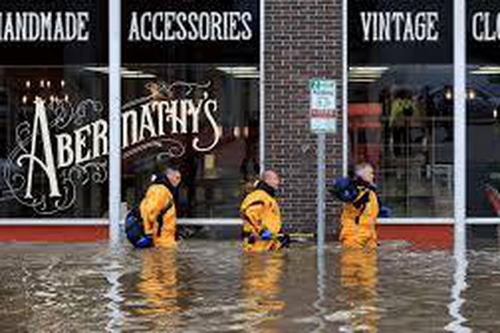 Floodwaters swept into Davenport, Iowa, sending residents scrambling