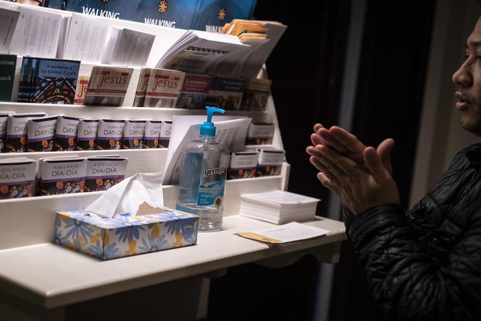 Worship in the Age of Coronavirus: Prayer, Elbow Bumps, Hand Sanitizer