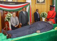 President Uhuru Kenyatta and first lady Margaret Kenyatta view the body of retired president Mzee Daniel Moi