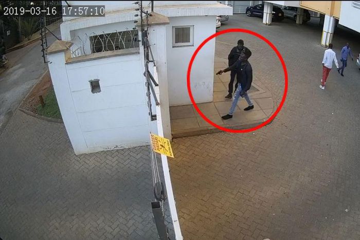 Man hunt for foreigner captured on video threatening to shoot security guard