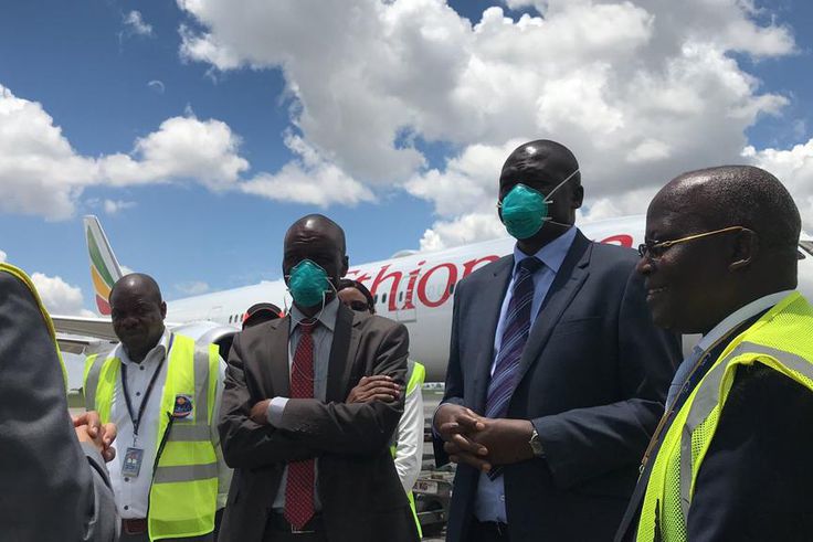 Kenya’s Ministry of Health officials receiving the country’s share of supplies at JKIA. (twitter)