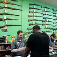 Are Guns 'Essential' in the Virus Era? Americans Stock Up as States Differ