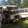 A man stands near the wreckage of the accident vehicles parked at Maga Maga Police Station in Mayuge District on February 25, 2019. PHOTOS BY YAZID YOLISIGIRA