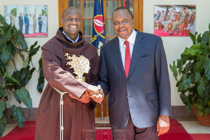 President Kenyatta with teacher Peter Tabichi