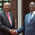 Kenya's President Uhuru Kenyatta (left) and opposition leader Raila Odinga shake hands after meeting at Harambee House, Nairobi on March 9, 2018
