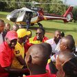 File image of Deputy President William Ruto (centre), and Labour Party of Kenya Leader Ababu Namwamba after alighting from a chopper