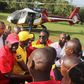 File image of Deputy President William Ruto (centre), and Labour Party of Kenya Leader Ababu Namwamba after alighting from a chopper