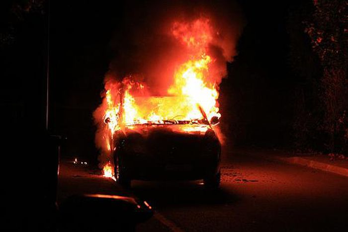 Angry residents attack and torch police vehicle