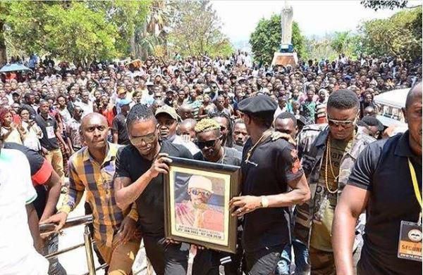 Mourners at Radio's burial led by Weasel and Jose Chameleone