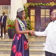 Miss Uganda Abanakyo Quiin shaking hands with President Museveni at State House in Entebbe
