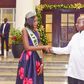 Miss Uganda Abanakyo Quiin shaking hands with President Museveni at State House in Entebbe