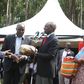 File image of DP Ruto presenting money at a past fundraiser in Kisii