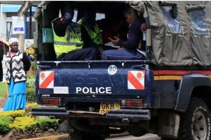 File image of a police vehicle ferrying suspects