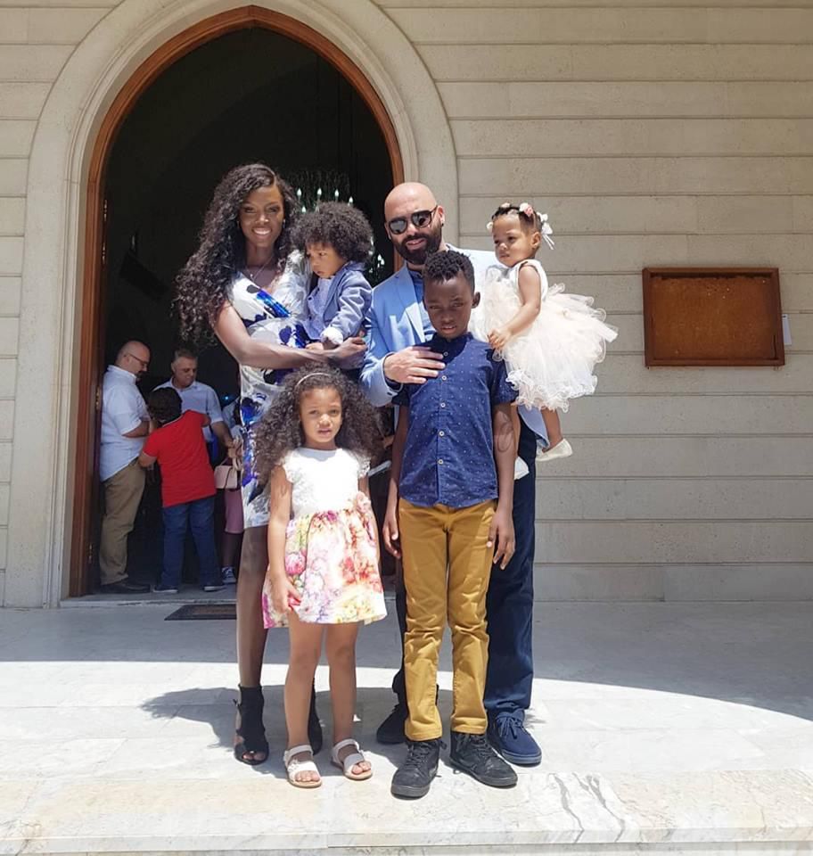 Dorah Mwima with her children and husband