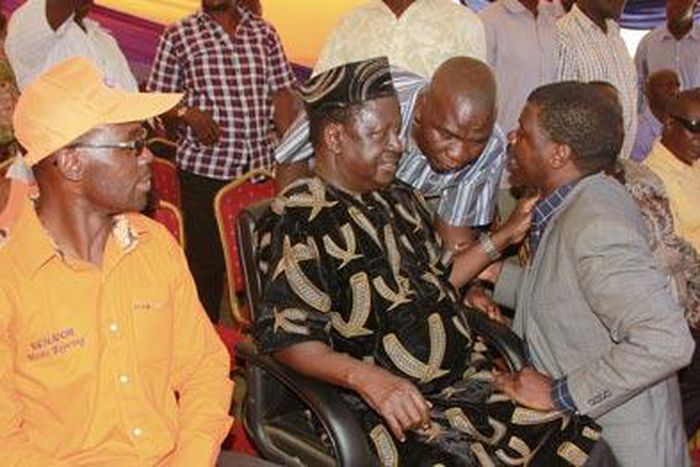 ODM leader Raila Odingawith TJ Kajwang’ and Mr Moses Kajwang’