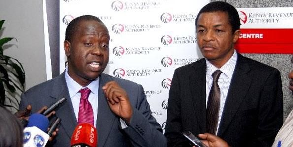 File image of CS Fred Matiangi with KRA Commissioner General John Njiraini