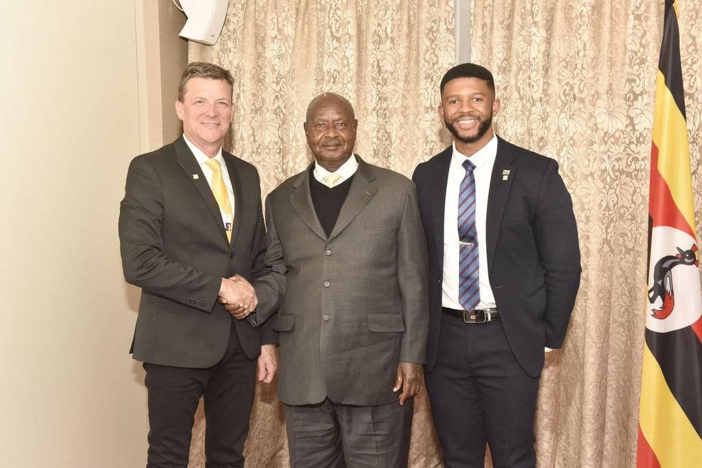 President Museveni and MTN Uganda CEO Rob Shuter (Left)