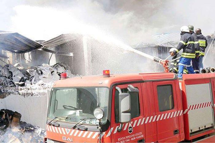Firefighters at Metro Plastics Kenya Ltd in Industrial Area, Nairobi on March 14, 2020. Police are investigating claims that employees at the factory were allegedly locked up overnight by the employer