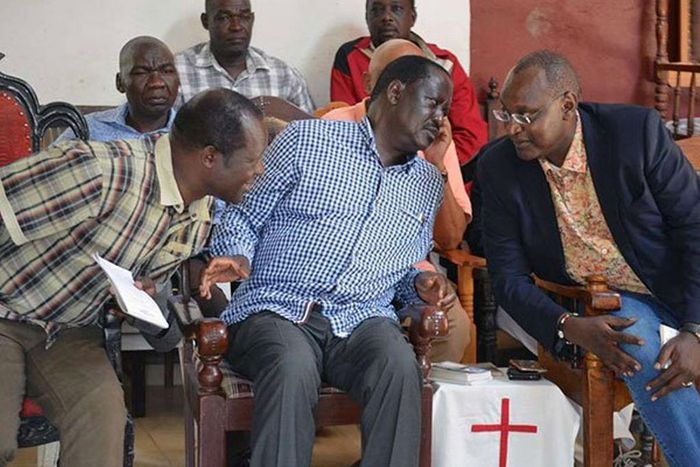 Jubilee Sec-Gen Raphael Tuju (L) AU Envoy Raila Odinga and Muhoho Kenyatta