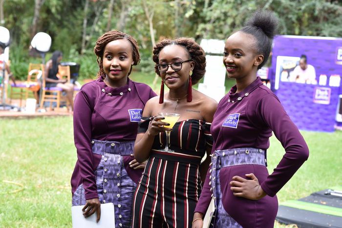 Ladies pose for a photo at the Dark and lovely 'own your crown' event