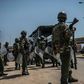 Kenyan police arrive to break up a protest from opposition supporters in Kisumu, western Kenya, on August 9, 2017