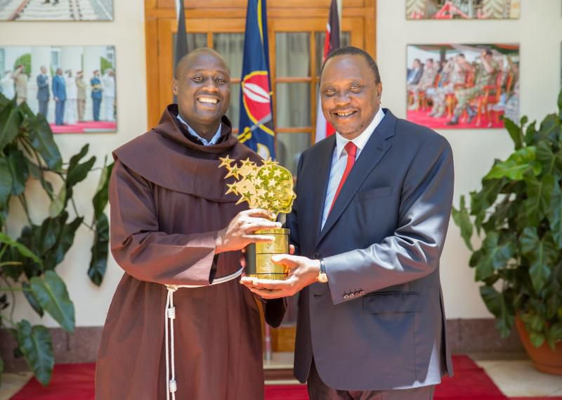 President Uhuru Kenyatta with teacher Peter Tabichi