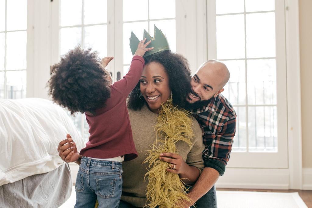 kid playing with parents