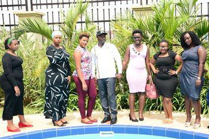 Kiwanda posing with some of the curvy women who attended launch of Miss Curvy (Photo: Lugalu)
