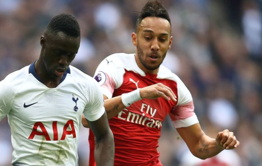 Pierre-Emerick Aubameyang and Davinson Sanchez battle for the ball during last season's game