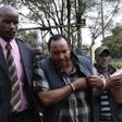 File image of Ferdinand Waititu with detectves  during his recent arrest over corruption