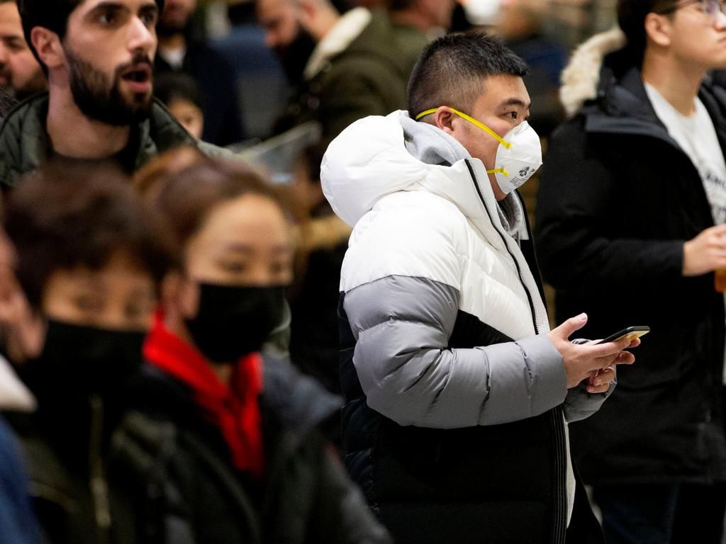 People wearing masks to avoid contracting Coronavirus