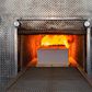 A coffin being cremated