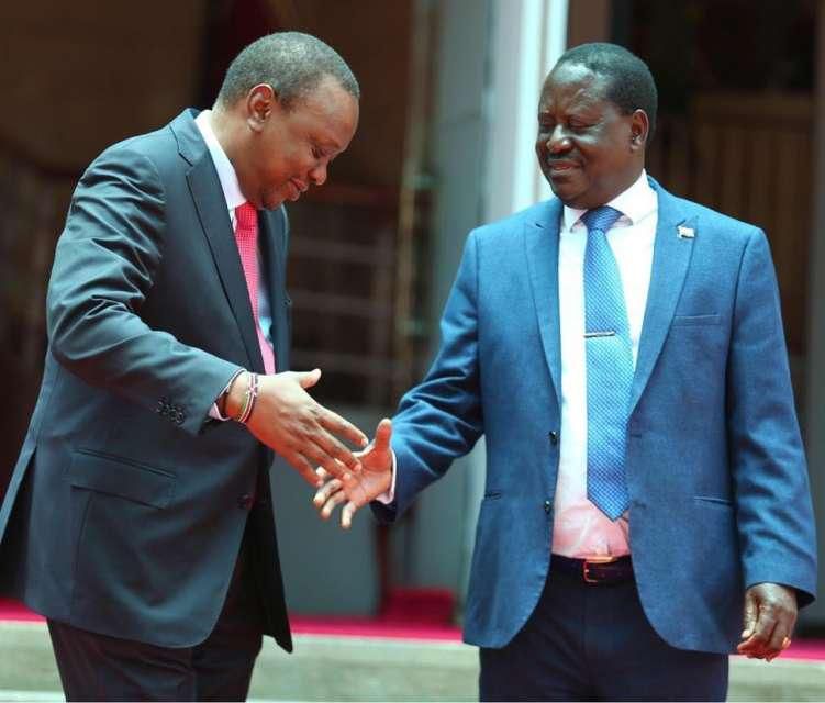 President Uhuru Kenyatta (left) and NASA leader Raila Odinga (right) handshake after the much heated 2017 General Election
