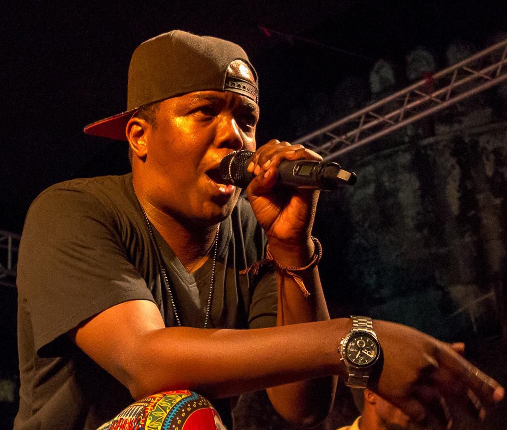 Tanzanian rapper AY on stage at a past performance
