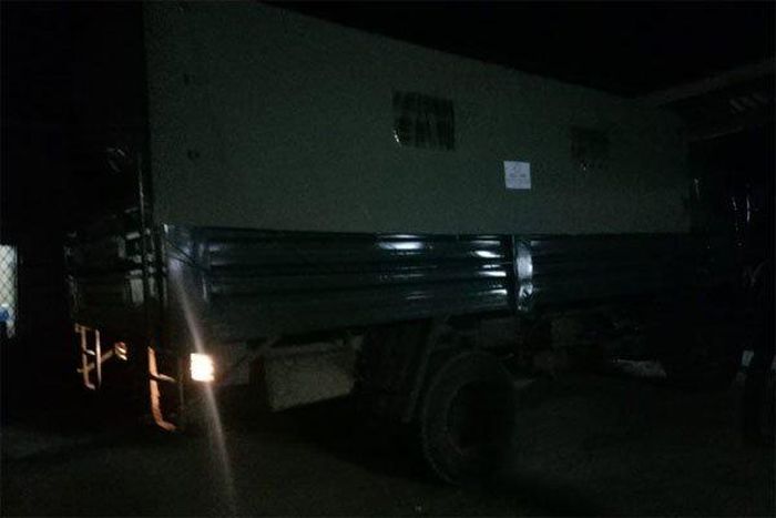 A police truck ferrying the bodies of the victims of the Friday night attack