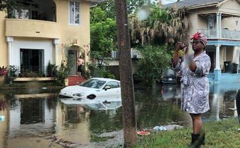 Storm, brimming with rain, barrels toward waterlogged Louisiana