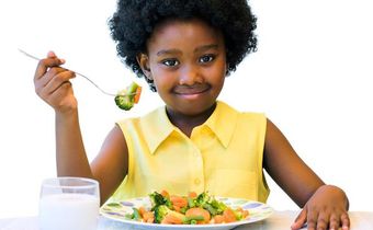 Little girl eating healthy