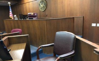 In a border courtroom, a migrant woman confronts her biggest fear