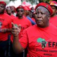 Leader of South Africa's left-wing Economic Freedom Fighters (EFF) Julius Malema gestures after arriving at the Johannesburg Stock Exchange (JSE) in Sandton, October 27, 2015. REUTERS/Siphiwe Sibeko
