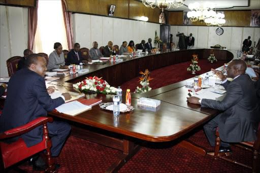 File image of President Uhuru Kenyatta and DP Ruto chairing a Cabinet meeting