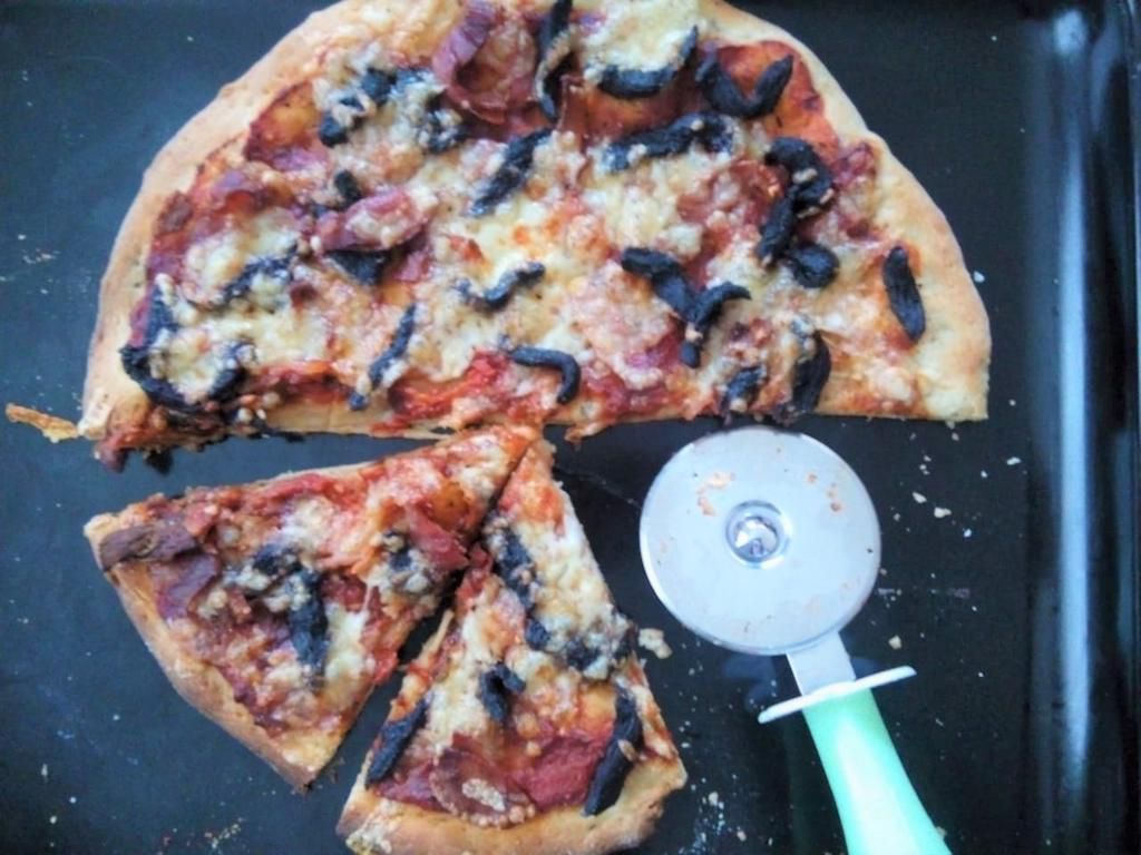Recipe with a Pulselive twist: Pizza dough with Beef and Bacon toppings with a sprinkle of Mozzarella cheese (after baking)