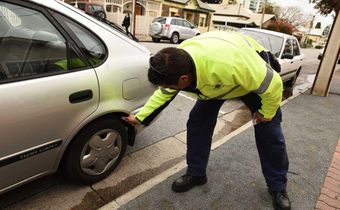 Parking police scramble as court tells them to put away the chalk