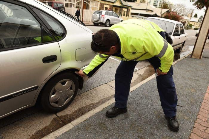 Parking police scramble as court tells them to put away the chalk