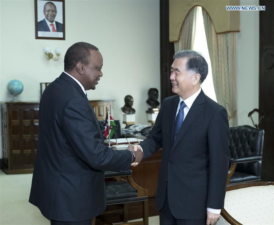 President Uhuru Kenyatta with Wang Yang, chairman of the National Committee of the Chinese People's Political Consultative Conference (CPPCC) at State House in 2018