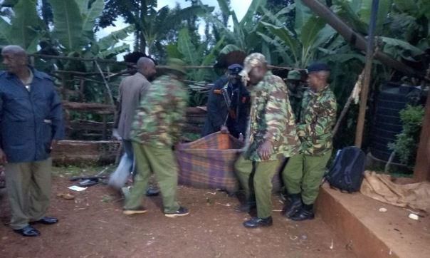 Police carry away a dead body during a past incident (Twitter)