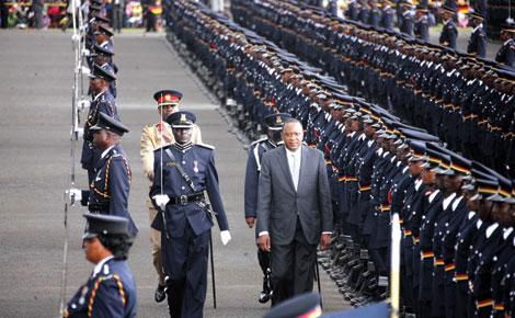 President Uhuru Kenyatta inspects a guard of honor mounted by the Police