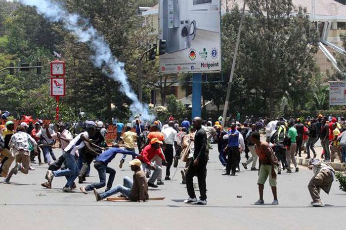 File image of police dispersing a crowd of demonstrators at a past political event