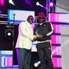 Khalighraph Jones receiving his award at the 2019 Pulse Music Video Awards (PMVA)